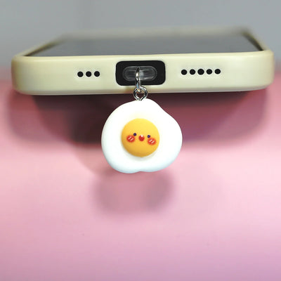 Phone dustproof plug, happy fried egg pendant, fun design for phone accessories, easy to use to protect the phone from dust and